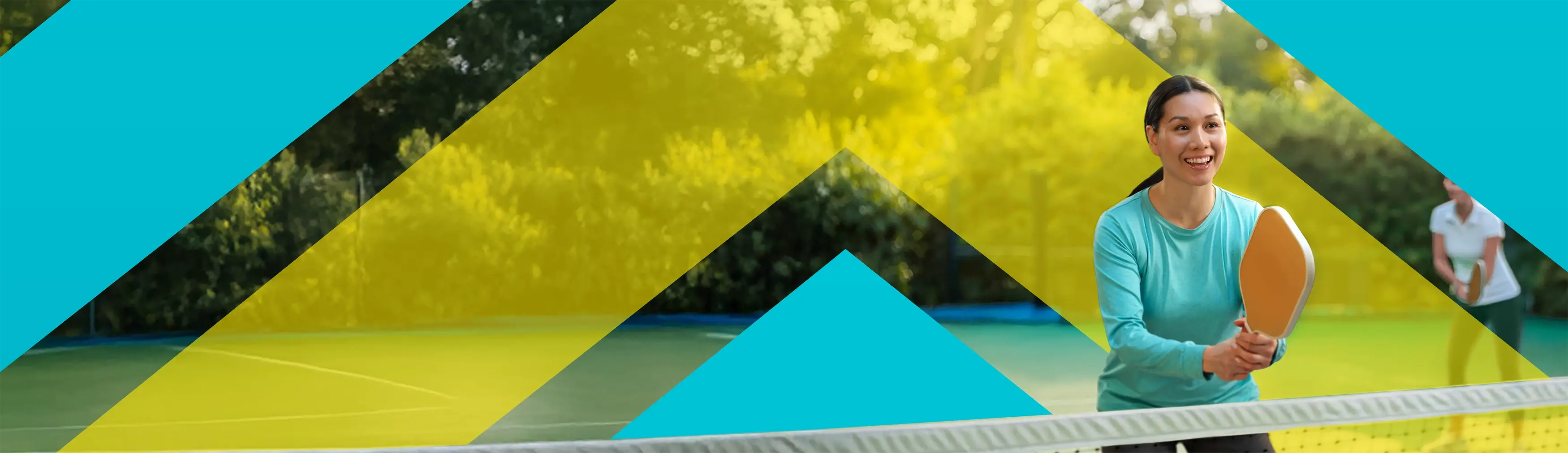 Woman playing pickleball with chevron background